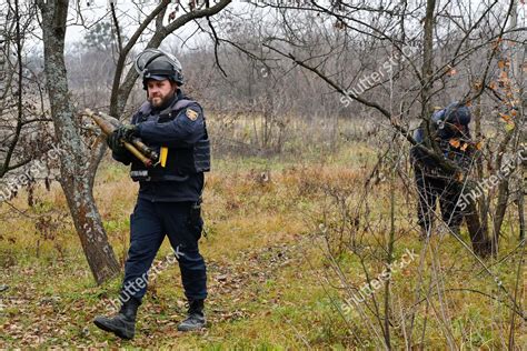 Ukrainian Sapper Carries Unexploded Projectiles During Editorial Stock