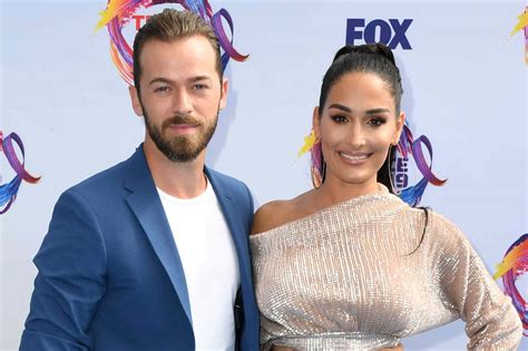 Artem Chigvintsev and Nikki Garcia Settle Divorce, Drop Restraining Orders