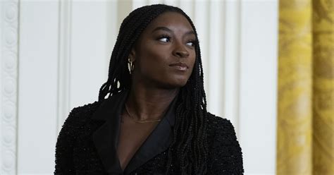 Simone Biles DIYs PVC Pouches With Jonathan Owenss Number | POPSUGAR