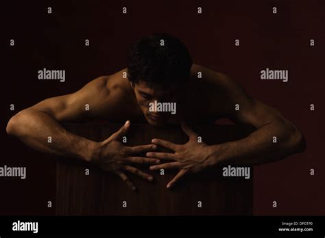 Nude Man Spreading Fingers Hands Close Together Stock Photo Alamy