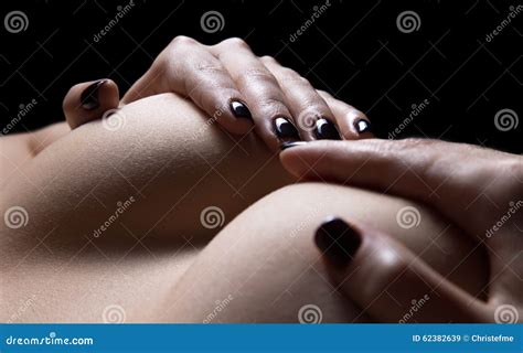 Woman S Hands Holding Naked Breasts In The Dark Stock Image Image Of Lying Nude 62382639