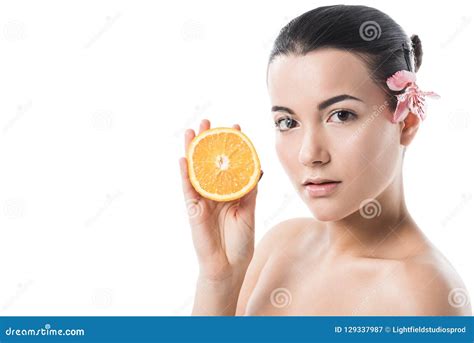 Attractive Naked Girl With Clean Skin Holding Orange And Looking At Camera Stock Image Image