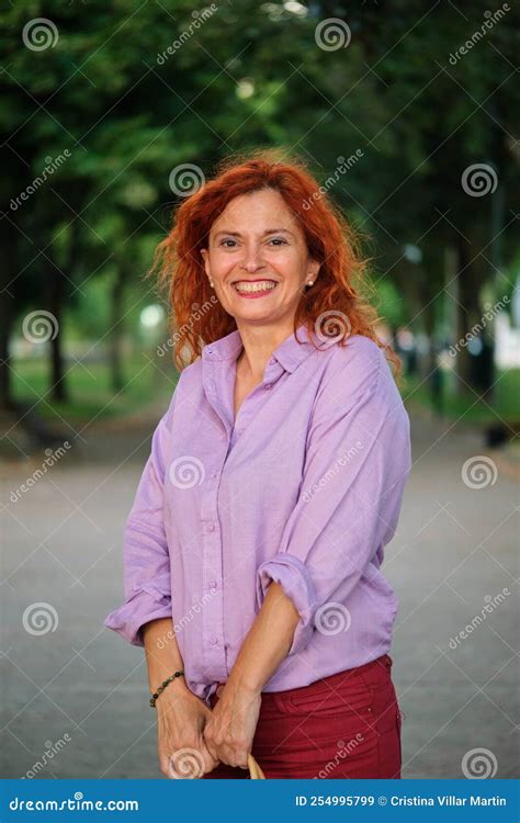 Outdoor Portrait Of Smiling Mature Redhead Woman Stock Image Image Of Middle Lady 254995799