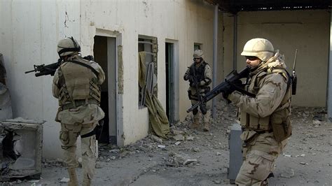 US names assault ship after Iraq battle that killed hundreds of Iraqi