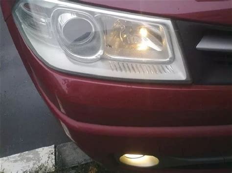 Рено меган 2 замена лампы ближнего света