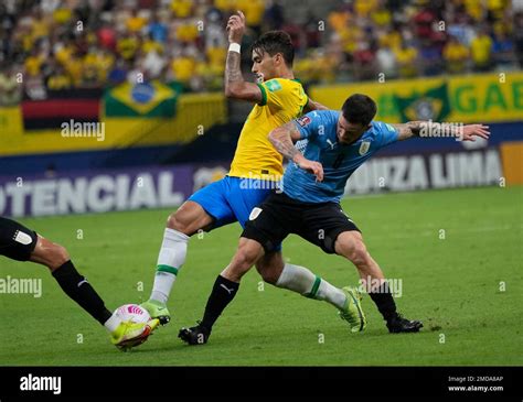 Brazil S Lucas Paqueta Left And Uruguay S Nahitan Nandez Fight For