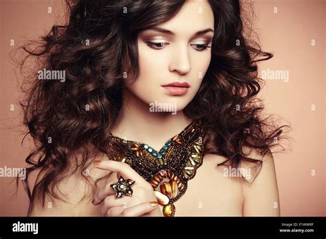 Portrait Of Beautiful Brunette Woman With Earring Perfect Makeup Fashion Photo Stock Photo Alamy