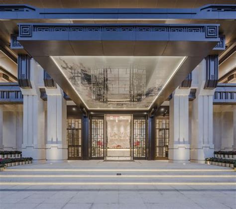 Lobby Entrance of a Grand Hotel with Seating and Symmetrical Architecture