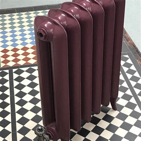 Traditional Cast Iron Radiator In Victorian Mosaic Floor Tiles Cast