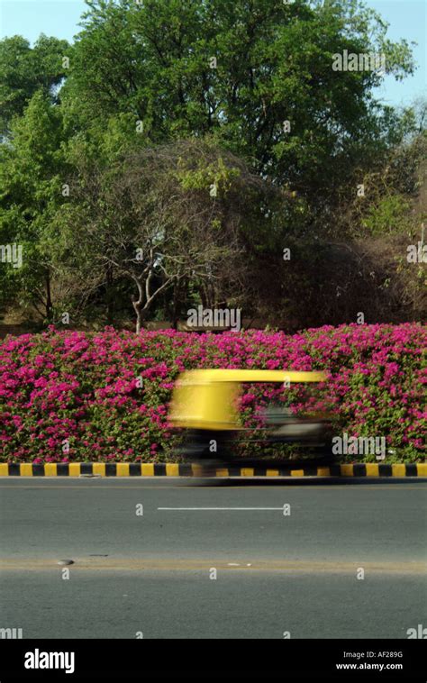 rickshaw whizzes   street  bangalore karnataka southern