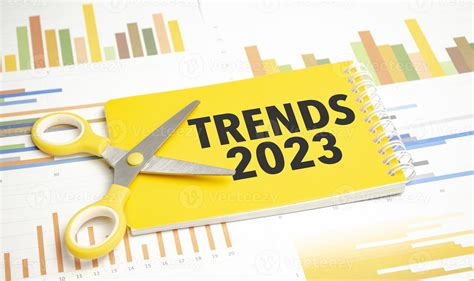 Trends 2023 . Text on yellow notebook and charts 16687900 Stock Photo ...