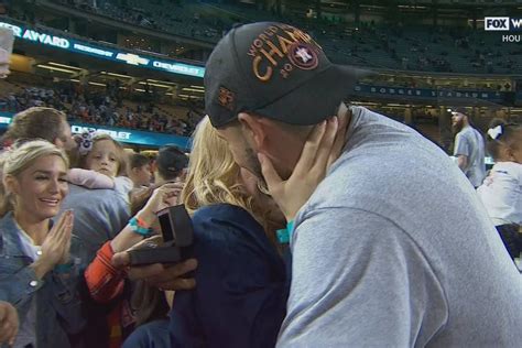 World Series Game 7: Carlos Correa proposes on field after Astros win ...