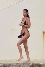 Bella Hadid Sexy Shows Off Her Physique Wearing A Black Bikini Out On Holiday At Eden Roc Hotel