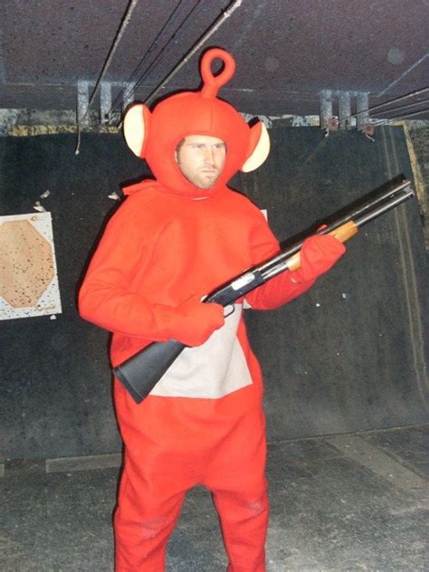 PsBattle: Man in a teletubbie costume with a shotgun : photoshopbattles