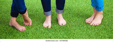 Three Women Naked Feet Standing Grass Stock Photo 657589282 Shutterstock