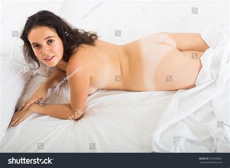 Long Haired Brunette Nude Woman On Bed Stock Photo 372928051 Shutterstock