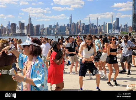 People Dancing At The Hot Honey Sundays Outdoor Dance Party In Greenpoint Terminal Market With
