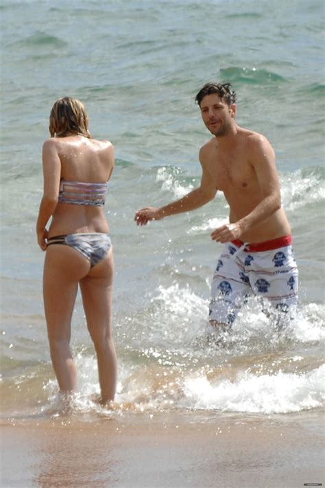 ASHLEY BENSON in Bikini at a Beach in Hawaii – HawtCelebs