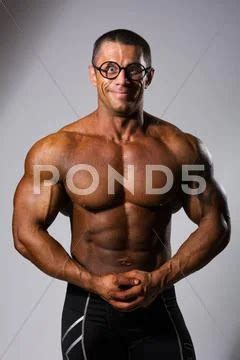 Happy Muscular Man With A Naked Torso And Funny Glasses Stock Photo 68710715