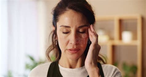 Mature Woman Headache And Tired In Home Massage Temple And Mental Health Burnout In Lounge