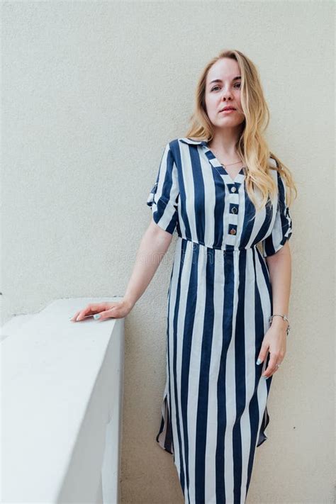 Beautiful Fashion Blonde Woman In Striped Dress On Balcony Stock Image Image Of Pretty Color