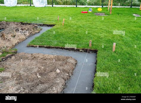 Foundation Footings Poured In A Ditch In The Yard Building A Terrace