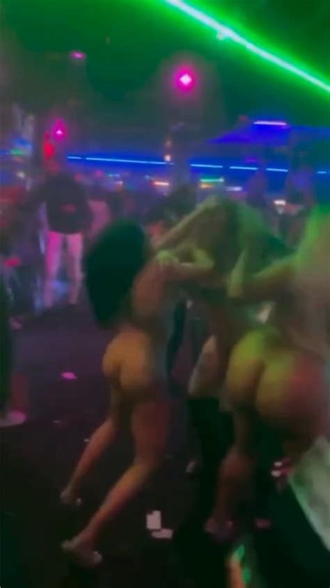 Half Naked Strippers Having A Disagreement Over Money