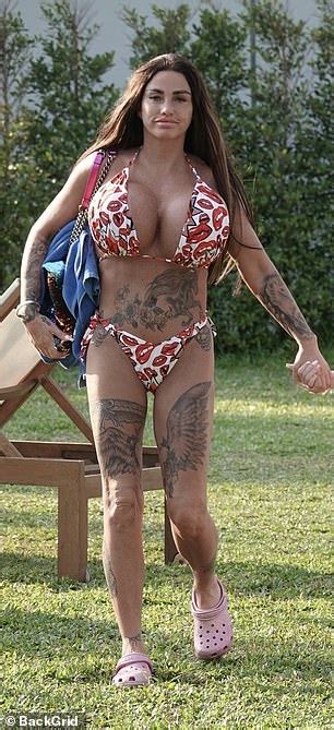 Katie Price Shows Off Her Biggest Boobs Ever In A Lip Print Bikini Daily Mail Online