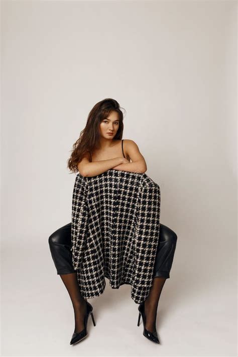 Sexy Brunette Black White Seated Black Chair Stock Photos Free Royalty Free Stock Photos