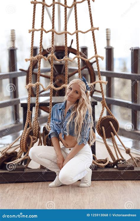 Beauty Fashion Blonde Girl Model In Pinup Style Posing Over Rope Stock Photo Image Of Look