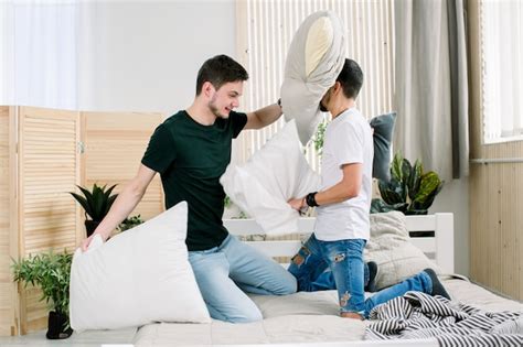 Premium Photo Picture Showing Happy Gay Couple Having Pillow Fight