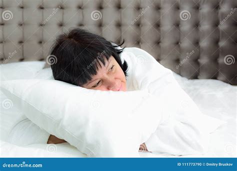 Woman Lies In Bed Stock Photo Image Of Mature Brunette 111773790