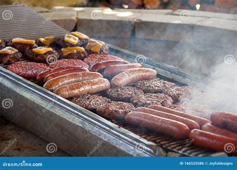 Hot Dogs And Hamburgers Grilling On Bbq Stock Photo Image Of