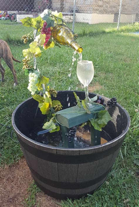 Wine bottle fountain, DIY | Fuentes para jardin, Hacer fuentes de agua ...