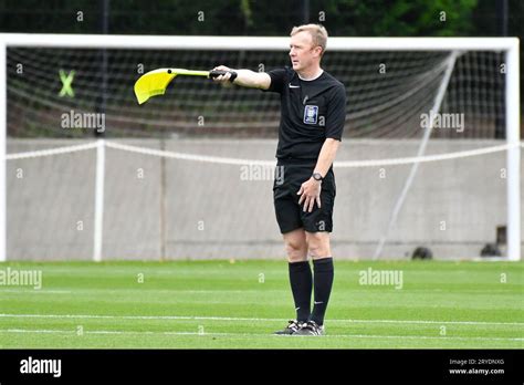 The Assistant Referee Raises Flag For Offside Hi Res Stock Photography