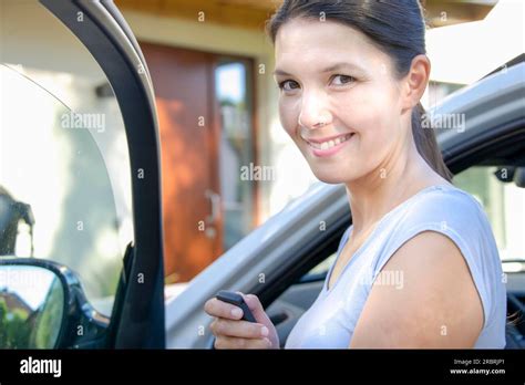 Brunette Attractive Woman Shows Her New Keys For Her Car Stock Photo Alamy