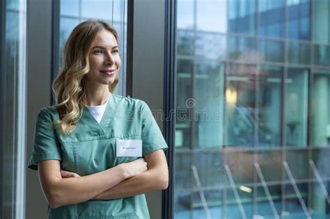 Cute Long Haired Blonde Caucasian Woman In Lab Coat In The Clinic Corridor Stock Image Image
