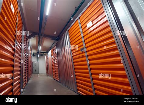 Secure Closed Garage Storage Compartments In Warehouse Stock Photo Alamy