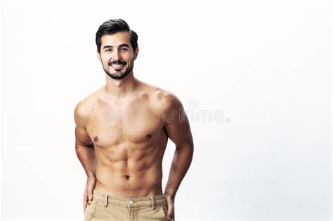 Male Athlete Model With Naked Torso And Packs Of Abs Sporty On White Background Trendy Clothing