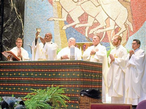 Catholics from around the world living in the archdiocese celebrate St