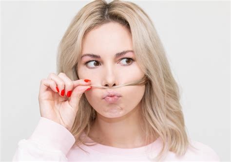 Premium Photo Funny Beautiful Blonde Girl Grimaces