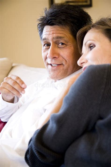 Mature Couple Relaxing Together On Couch Stock Image Image Of Loving