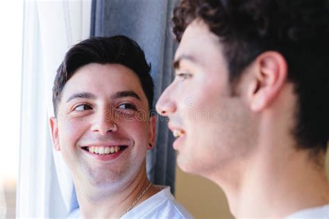Gay Couple Sharing A Special Moment In The Morning By The Window Homosexual Romantic Tenderness