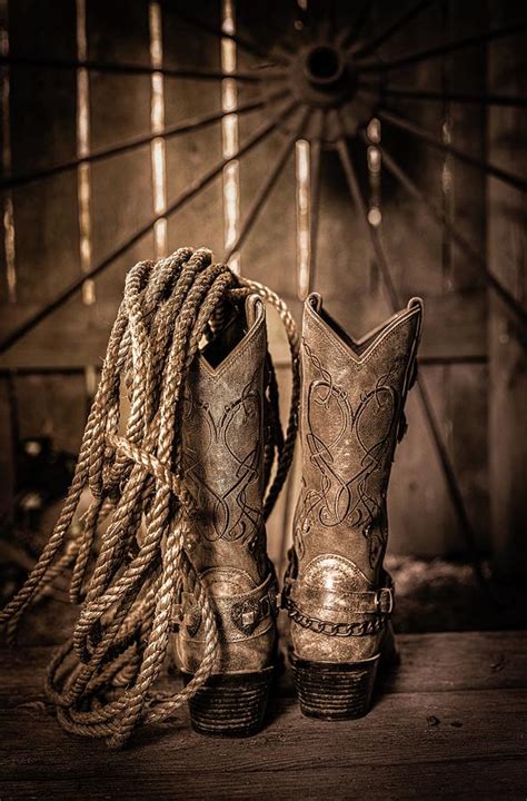 Old Western Boots And Rope Photograph By Leilani Heying Fine Art America