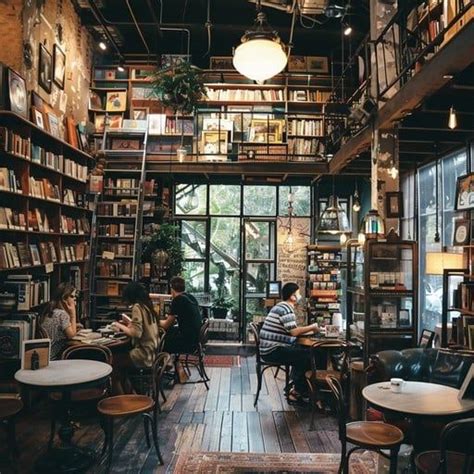 cozy bookstore cafe filled  patrons  surrounded  shelves