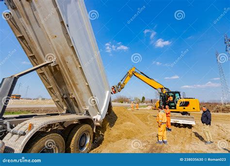 Dump Truck Is Unloading Soil Stock Photo Image Of Development