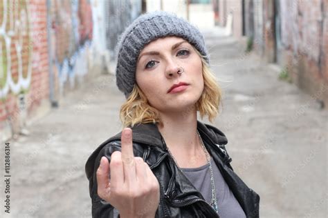 Aggression Unkind Crazy Woman Rocker Showing Her Middle Finger Fuck Sign Provocation Concept