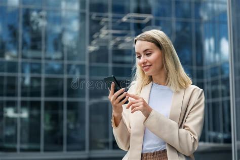 Long Haired Blonde Woman With A Phone In Hand Stock Image Image Of Workplace Planning 274066221