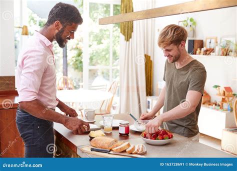 Male Gay Couple At Home In Kitchen Making Breakfast Together Stock Image Image Of Boyfriend
