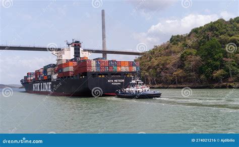 Nyk Line Container Ship Tugboat And Lighthouse Editorial Image